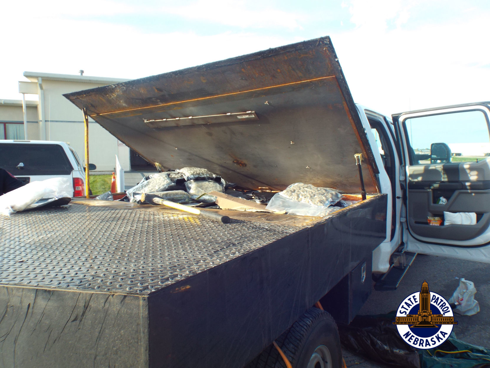 250 pounds of marijuana in fake compartment
